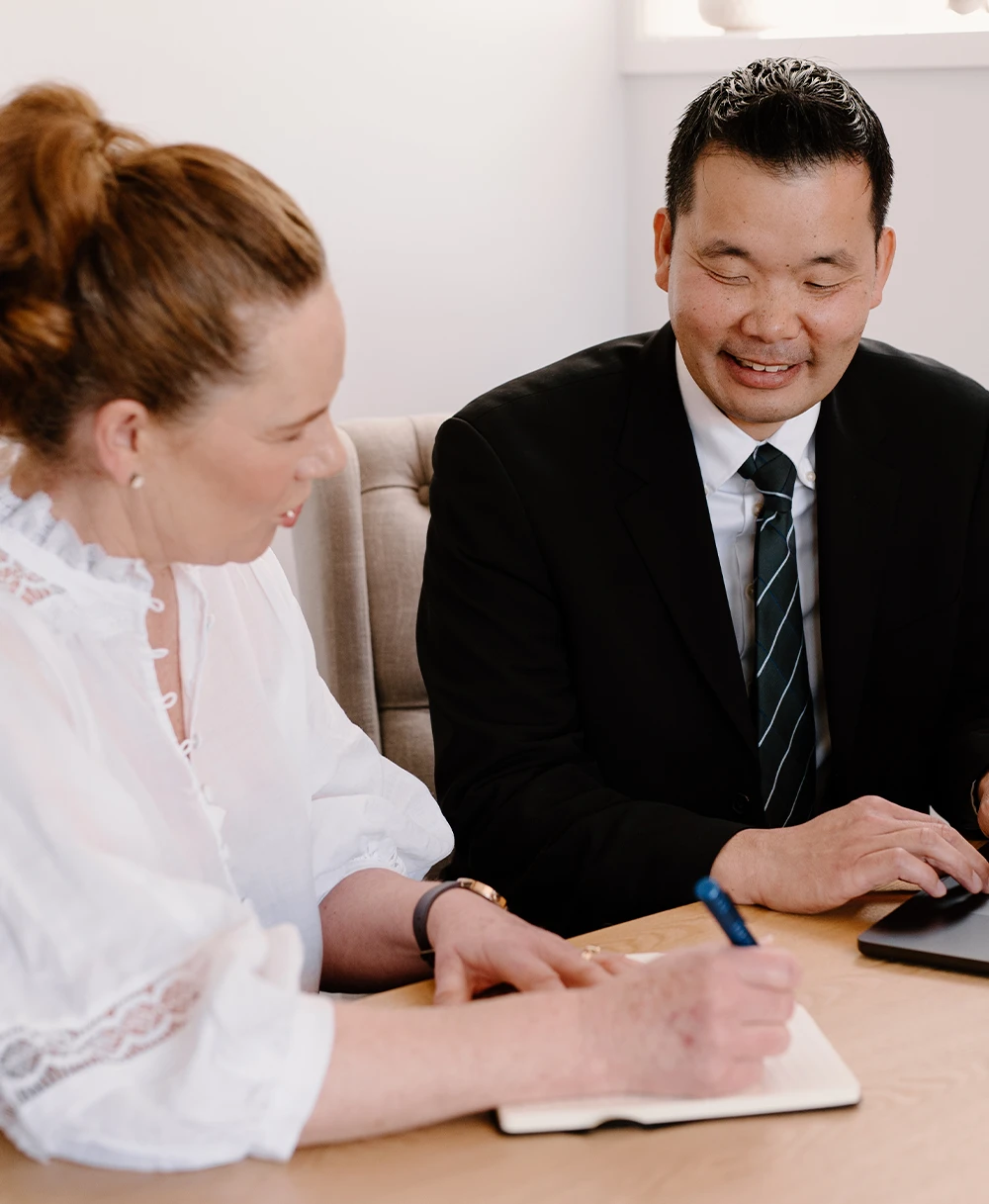 Co-sourcing team discussing a document